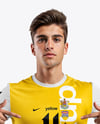Man Wearing Soccer Jersey and Shorts Mockup