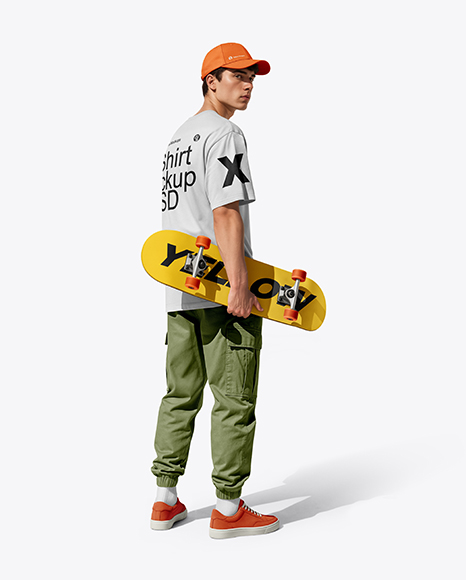 Young Man Wearing T-Shirt and Cargo Pants Holding Skateboard Mockup