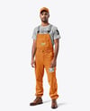 Man Wearing a Bib Overalls and T-Shirt Mockup