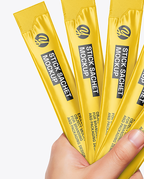 Five Sachets in a Hand Mockup