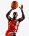 Basketball Player Wearing Jersey and Shorts Holding a Basketball Mockup