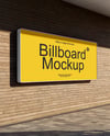 Outdoor Billboard on Wooden Wall Mockup