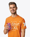 Man Wearing a T-shirt Holding 12oz Drink Can Mockup