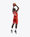 Basketball Player Wearing Jersey and Shorts Throwing Basketball Mockup