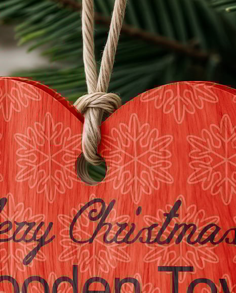 Wooden Heart Shaped Toy on Christmas Tree Mockup