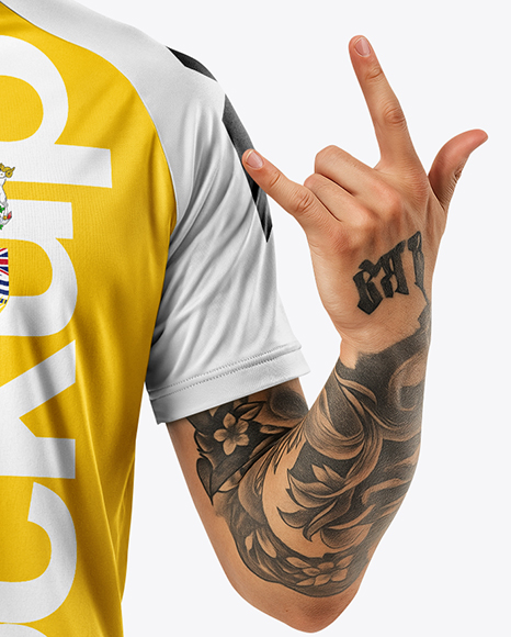 Man Wearing Soccer Jersey and Shorts Mockup
