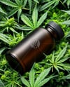 Amber Supplements Bottle on a Hemp Leaves Mockup