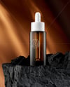 Amber Dropper Bottle on the Rock Mockup