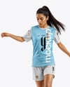 Female Soccer Player Wearing Jersey and Shorts Mockup