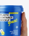 Matte Plastic Container in a Hand Mockup