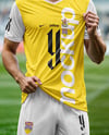 Soccer Player Wearing a Full Kit at the Stadium Mockup