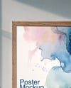Wooden Framed Poster in a Cozy Workspace Mockup