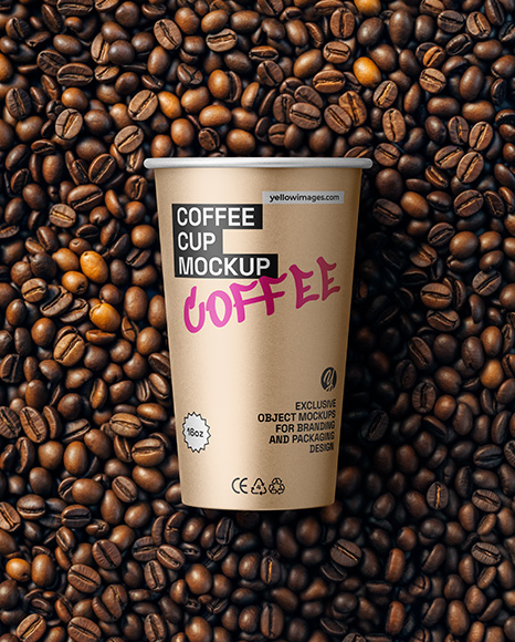 16oz Paper Cup on a Stack of Coffee Beans Mockup