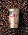 16oz Paper Cup on a Stack of Coffee Beans Mockup