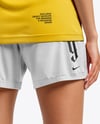 Female Soccer Player Wearing Jersey and Shorts Mockup
