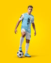 Man Wearing Soccer Jersey and Shorts Mockup