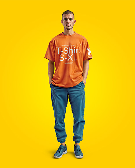 Man Wearing an Oversize T-shirt and Pants Mockup