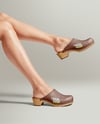 Pair of Clogs on Woman's Legs Mockup