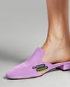 Pair of Suede Mules on Woman's Legs Mockup