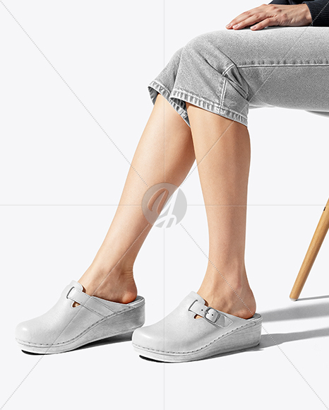 Pair of Clogs on Woman's Legs Sitting on Stool Mockup