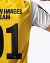 Man Wearing Soccer Jersey and Shorts Mockup