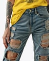 Woman with Tattoo Wearing T-shirt and Ripped Jeans Mockup