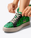 Woman Tying Sneakers Mockup
