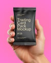 Matte Trading Card Pack in a Hand Mockup