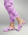 Pair of Suede Mules on Woman's Legs with Pants Mockup