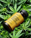 Amber Supplements Bottle on a Hemp Leaves Mockup