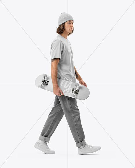 Young Man Wearing T-Shirt and Beanie Hat Holding Skateboard Mockup