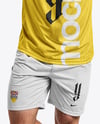 Man Wearing Raglan Soccer Jersey and Shorts Mockup