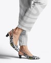 Pair of Slingbacks on Woman's Legs Mockup