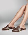 Pair of Leather Mules on Woman's Legs Mockup