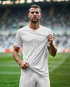 Soccer Player Wearing a Full Kit at the Stadium Mockup