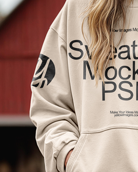Young Woman in Sweatshirt and Joggers Standing on Hay Block at Pumpkin Patch Mockup