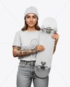 Woman Wearing T-shirt and Beanie Hat with Skateboard Mockup