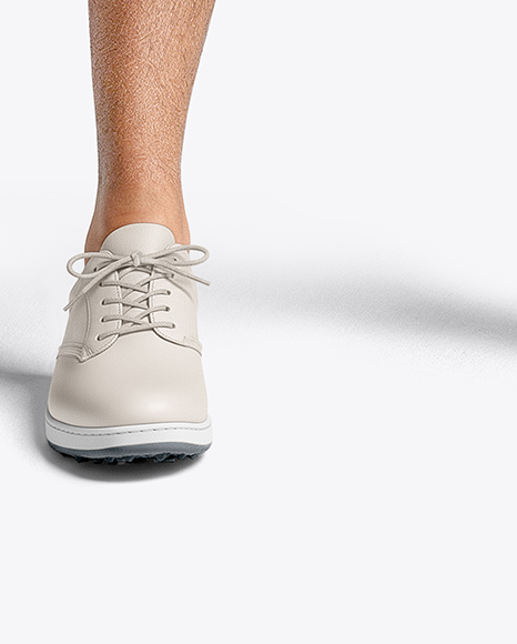 Man Wearing Golf Shirt and Shorts with Ball Mockup