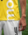 Soccer Player Wearing a Jersey and Shorts at the Stadium Mockup
