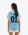 Female Soccer Player Wearing Jersey and Shorts Mockup