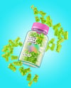 Plastic Bottle with Flying Gummies Mockup