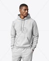 Black Man Wearing a Hoodie and Pants Mockup