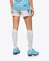 Female Soccer Player Wearing Jersey and Shorts Mockup