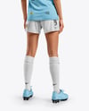 Female Soccer Player Wearing Jersey and Shorts Mockup