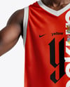 Basketball Player Wearing a V-Neck Jersey and Shorts Holding a Basketball Mockup