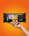 Matte Snack Package in a Hand Mockup