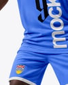 Basketball Player Wearing a Crew Neck Jersey and Shorts Holding a Basketball Mockup