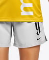 Woman Wearing Soccer Jersey and Shorts Mockup