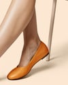 Pair of Leather Ballet Flats on Woman's Legs Mockup