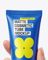 Matte Cosmetic Tube in a Hand Mockup